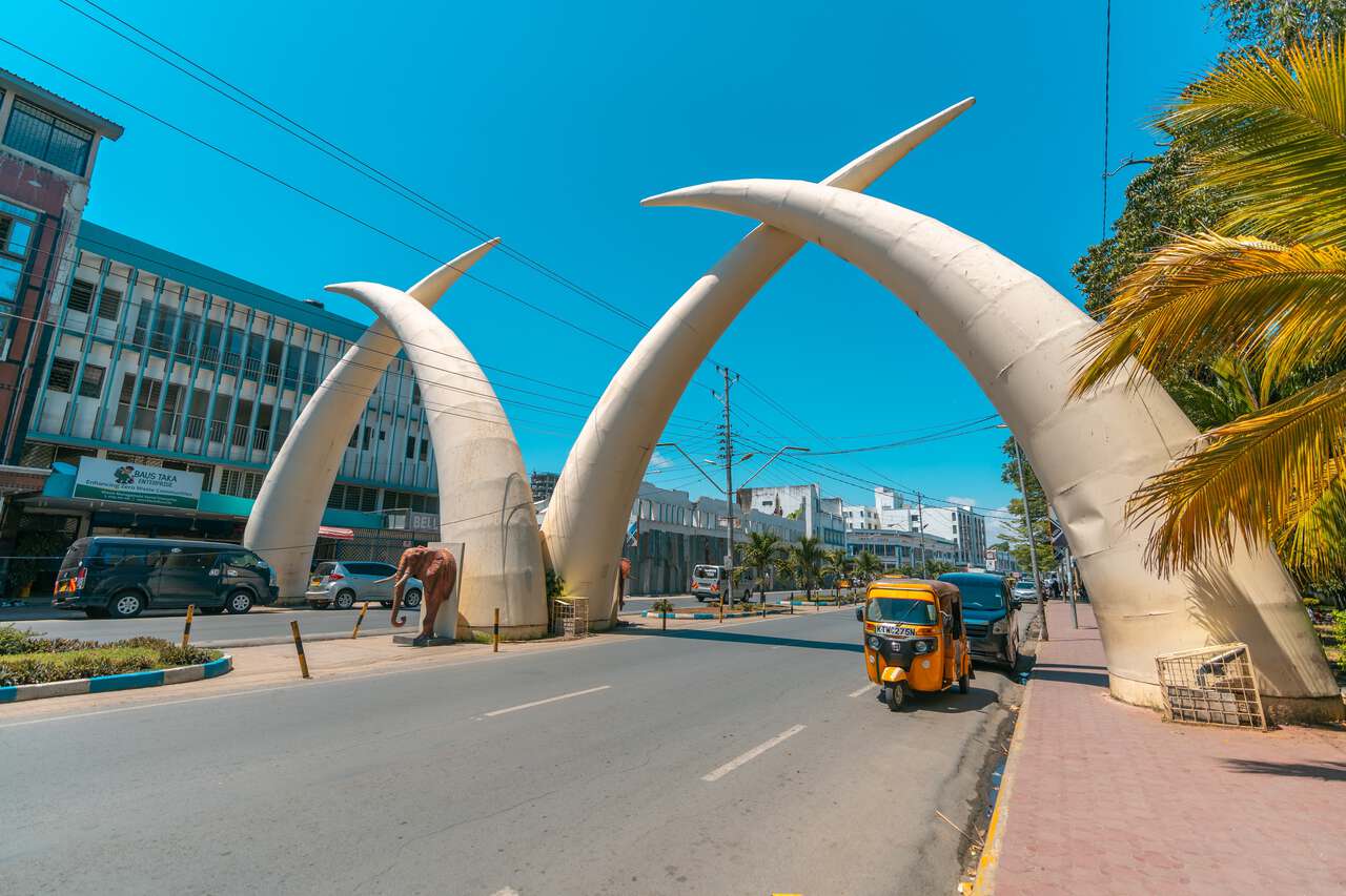 The Mombasa Tusks monument arching over Moi Avenue