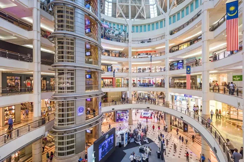 The atrium inside Suria KLCC mall, directly beneath the Petronas Towers
