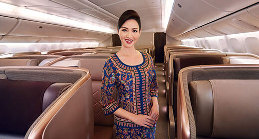 Singapore Airlines cabin crew aboard an aircraft